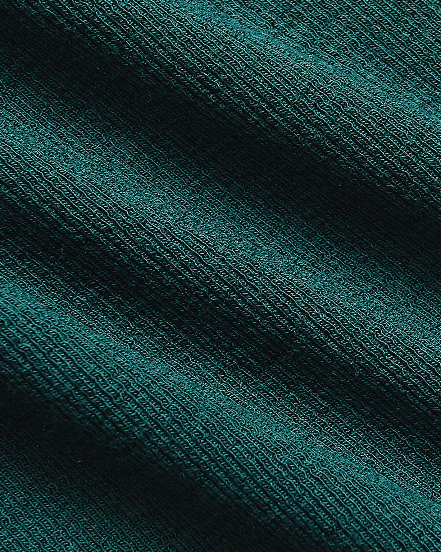 Close-up of Womens Deep Emerald Ribbed 3/4 Sleeve Scoop Neck Tee fabric.