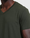 Dark Olive V Neck T Shirt on model's upper torso.