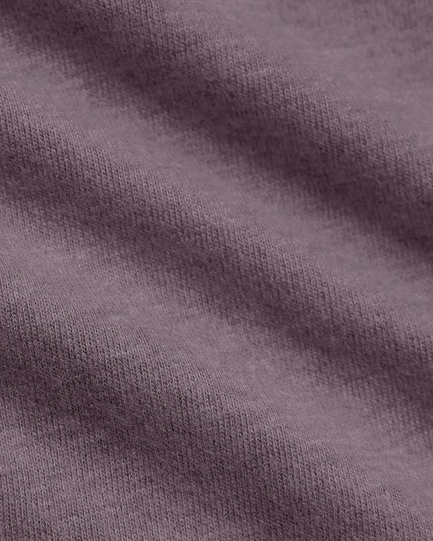 Dark Heather Amethyst Classic V-Neck, close-up of soft knit fabric.