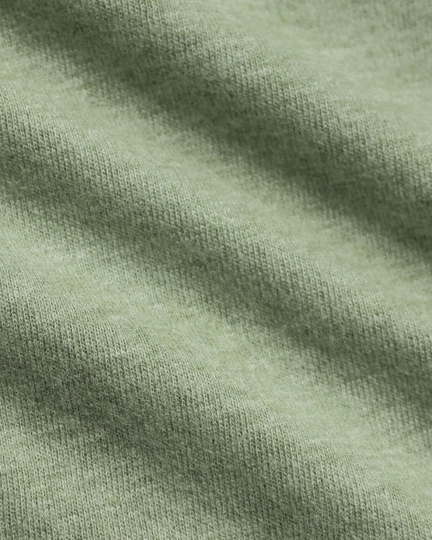 Close-up of Dark Heather Bay Green Classic V-Neck fabric texture.