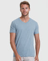 Man wearing Classic V-Neck 10-Pack shirt, relaxed pose.