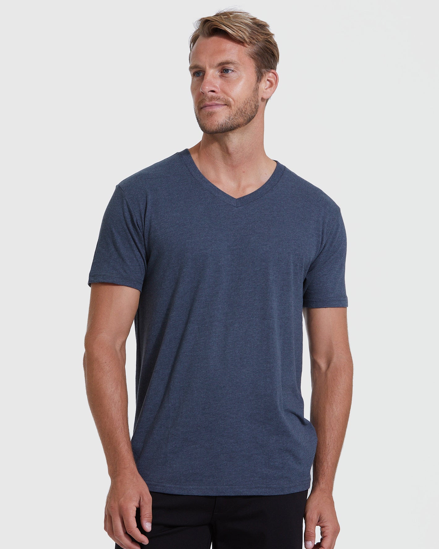 Heathers V-Neck Tee 3-Pack modeled in navy, showcasing fit and style.