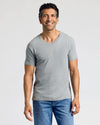 Man wearing Heathers V-Neck Tee in heather-gray.