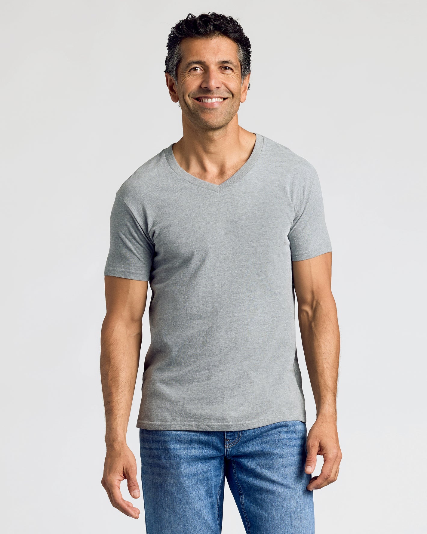 Man wearing Heathers V-Neck Tee in heather-gray.