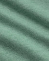 Light Heather Greenery Classic V-Neck, close-up of soft green knitted fabric.
