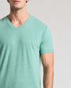 Light Heather Greenery Classic V-Neck on a man’s upper body.