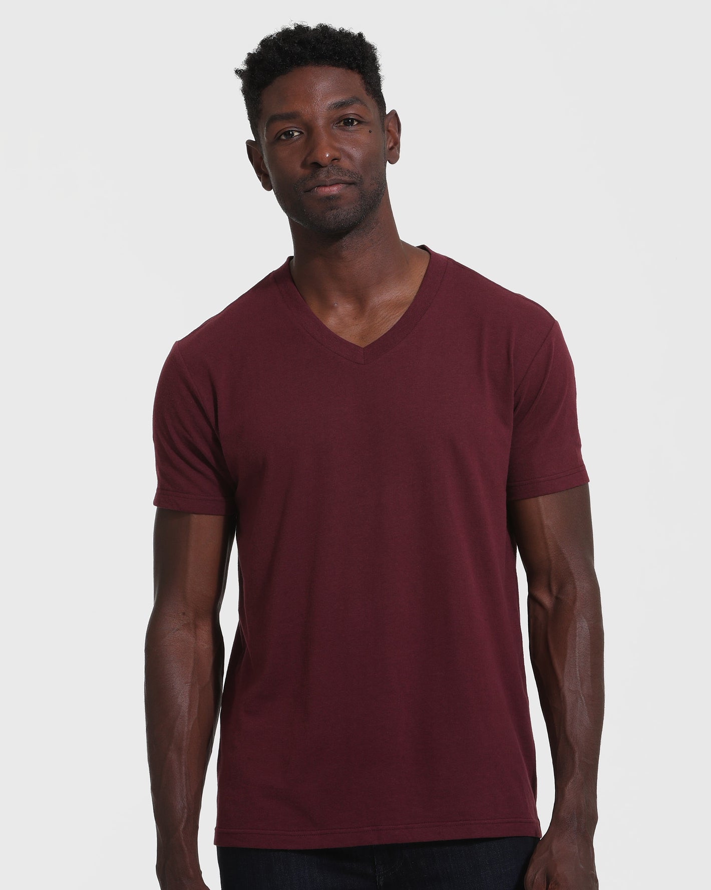 Mahogany V Neck T Shirt on man with neutral expression.