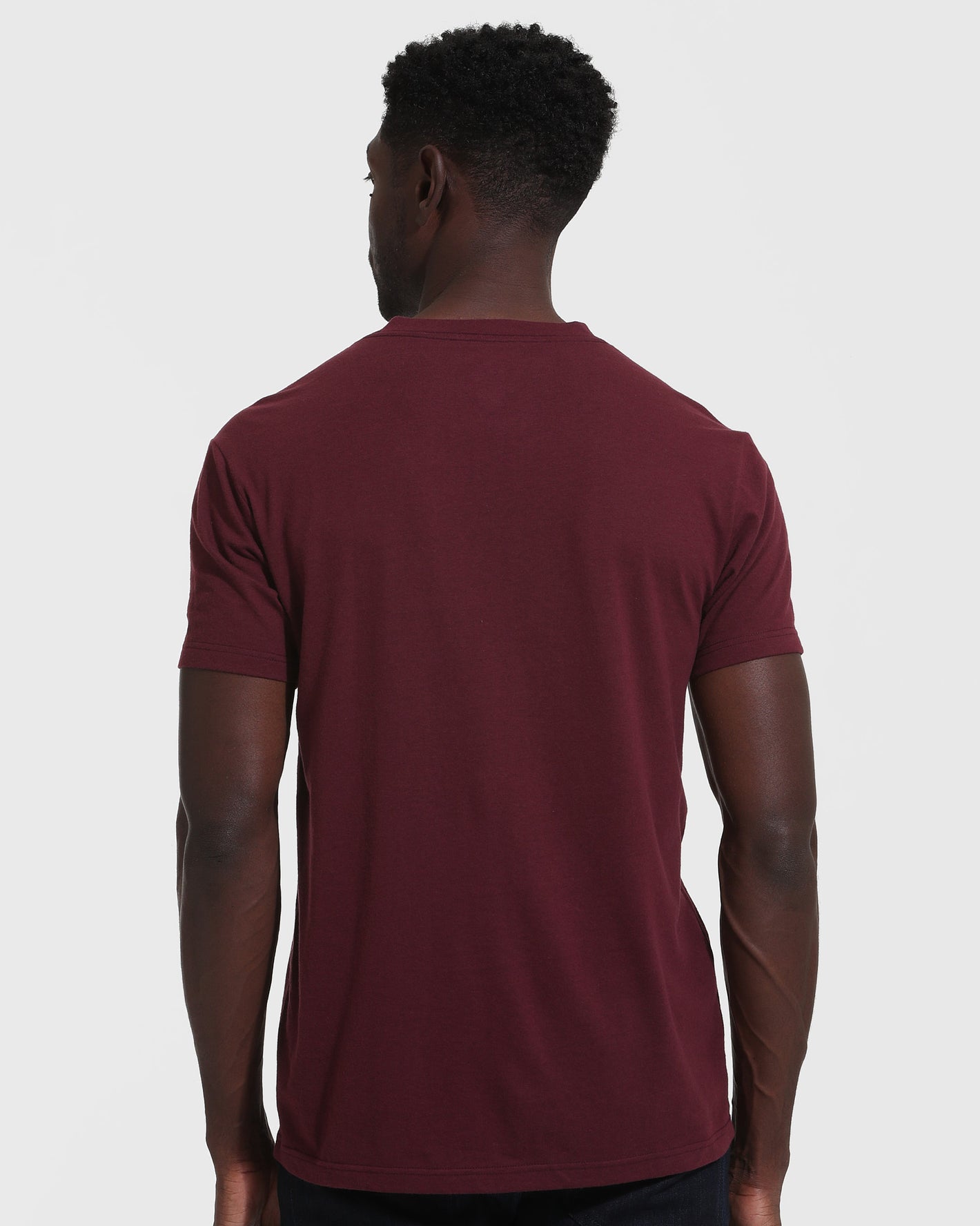 Back view of Mahogany V Neck T Shirt on model.