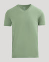 Green t-shirt on a light gray background