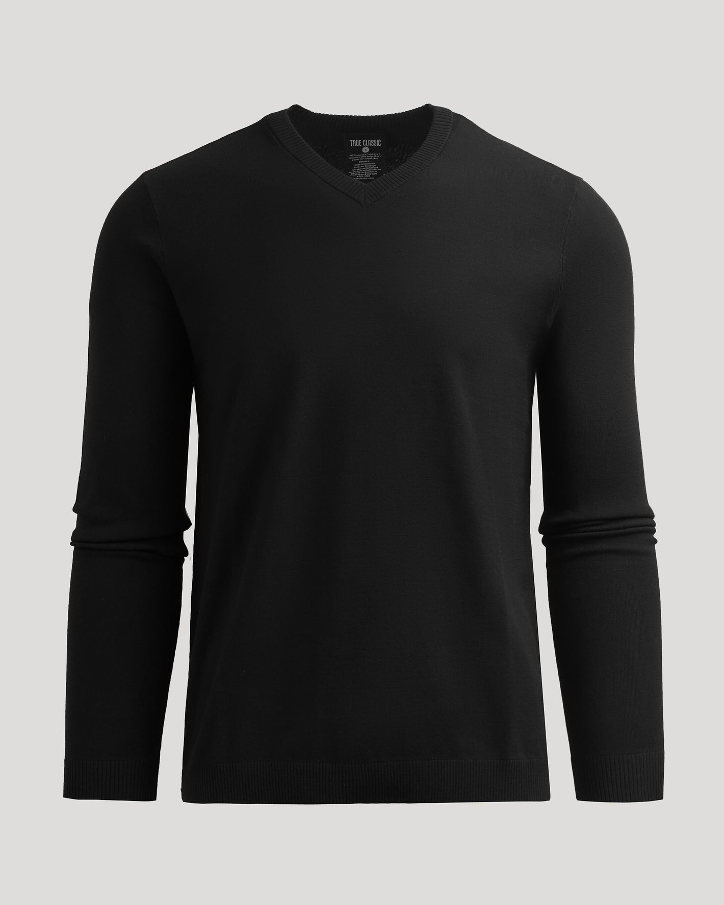 Black Dressy V-Neck Sweater, ultra-soft, long-sleeved, ideal for layering.