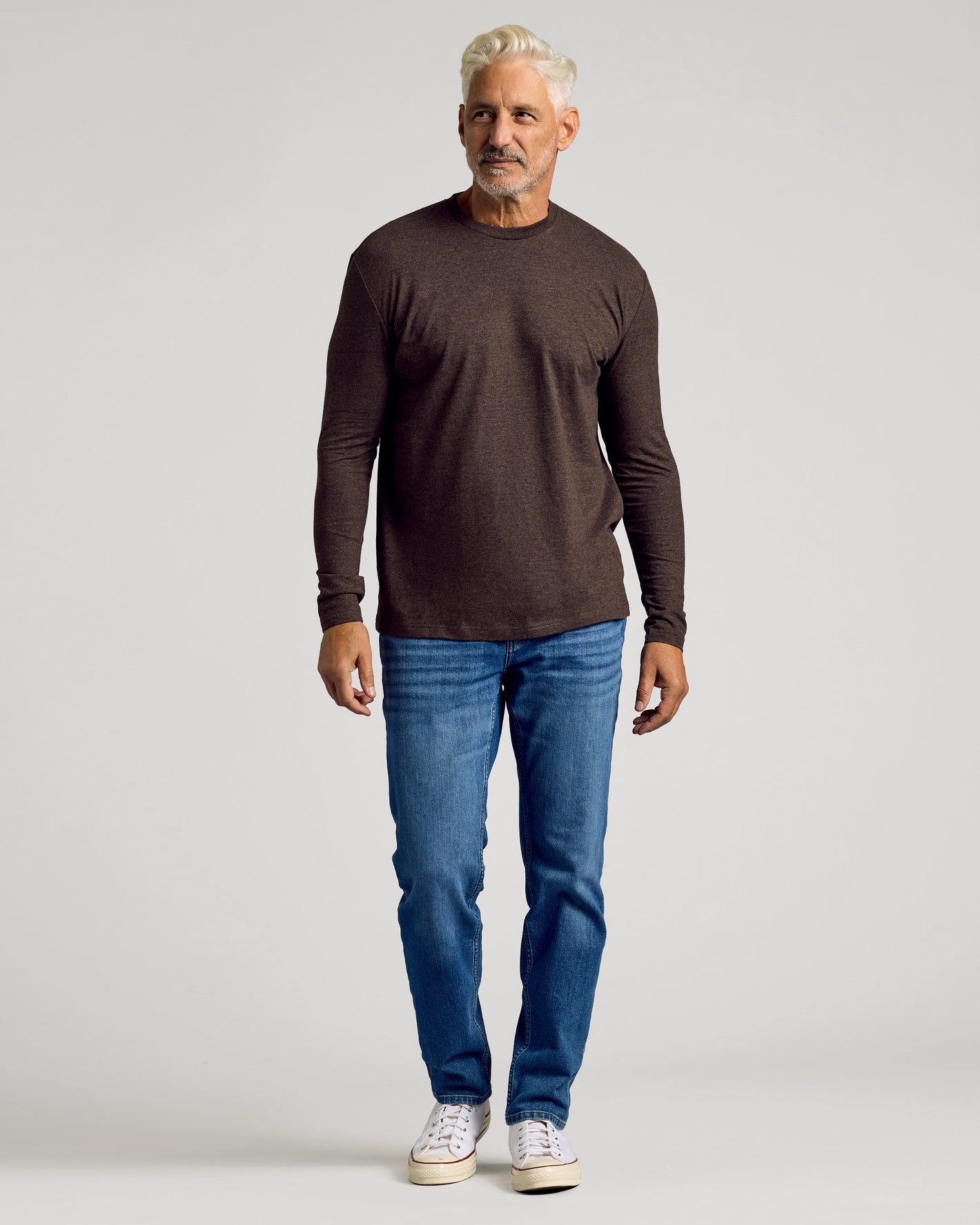 Dark Heather Cocoa Classic Long Sleeve Crew Neck worn by man in jeans.