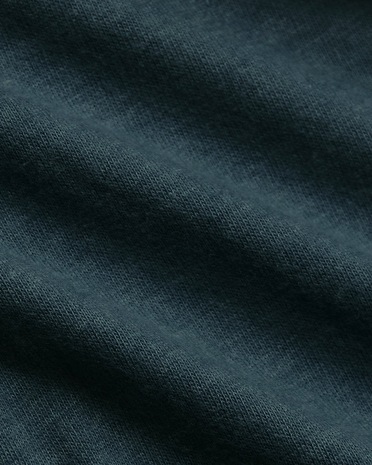 Dark Heather Pond Long Sleeve Crew Neck Tee, dark teal knit fabric close-up.