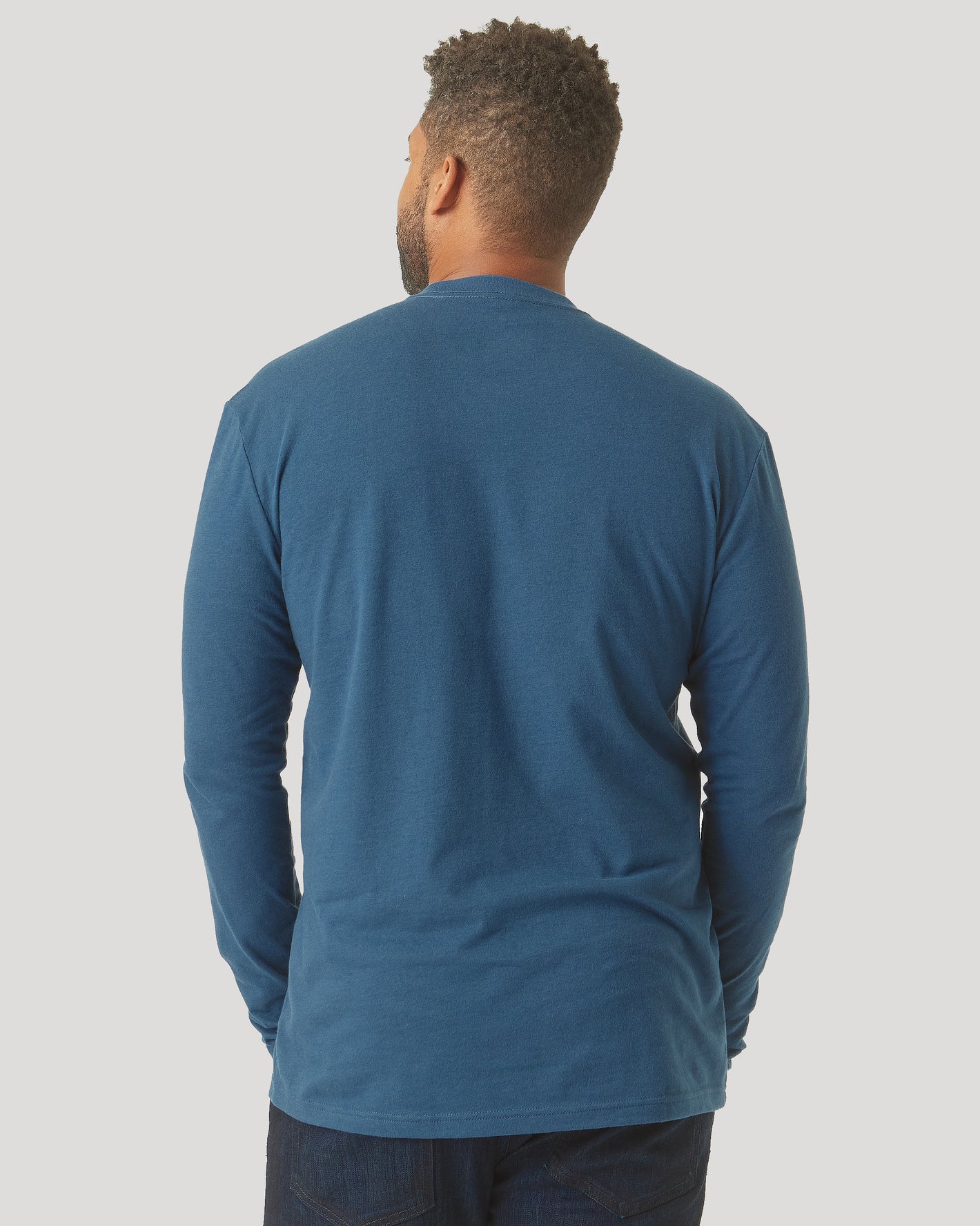 Back view of Deep Sea Blue Long Sleeve T Shirt worn.
