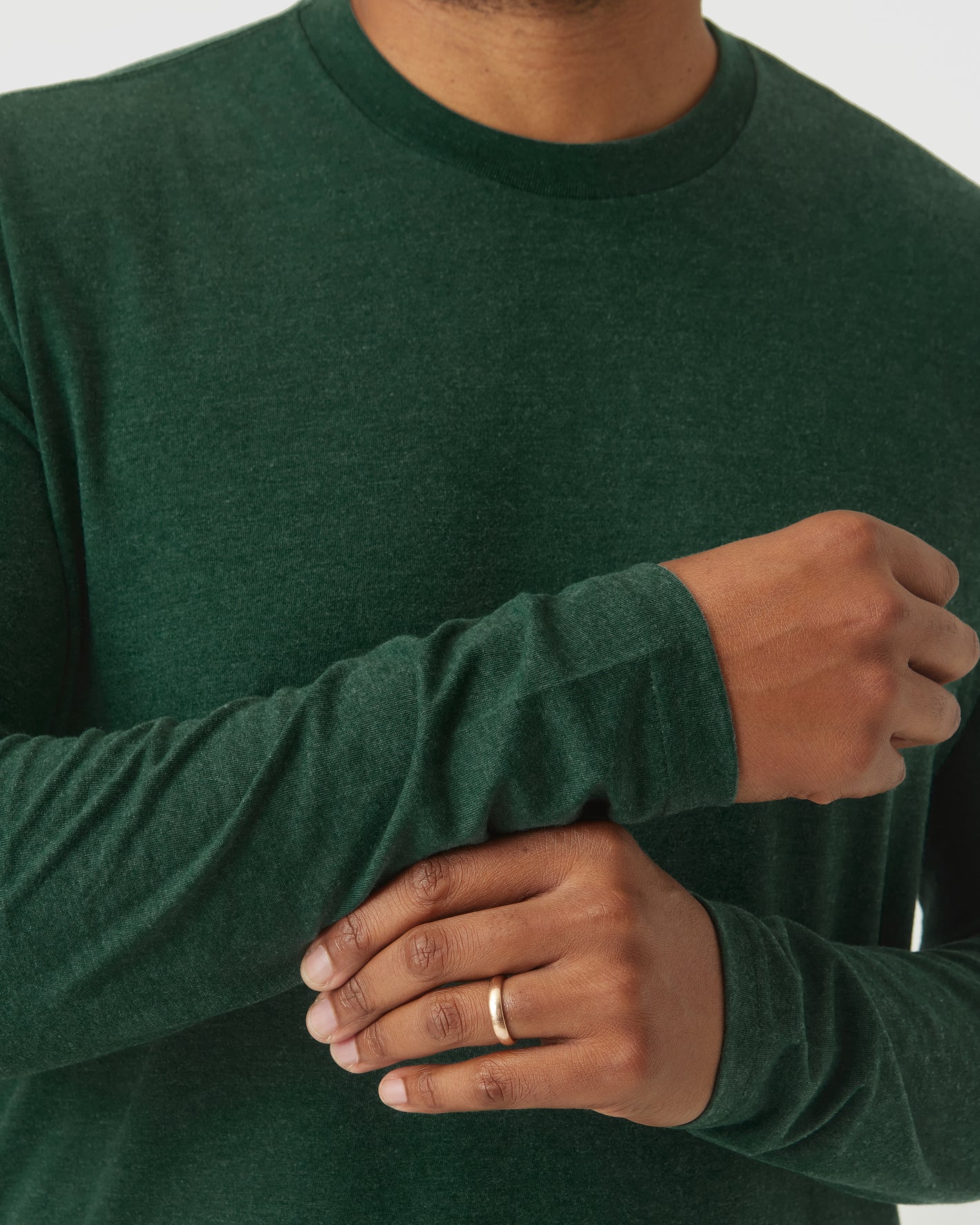 Ever Green Heather Long Sleeve T Shirt worn by model with gold ring.
