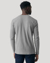 Man wearing Glacier Gray Classic Long Sleeve Crew Neck, back view.