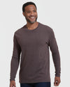 Man wearing Heather Dark Oak Classic Long Sleeve Crew Neck, smiling slightly off-camera.