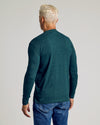 Back view of a man in Dark Heather Seafarer Classic Long Sleeve Crew Neck.