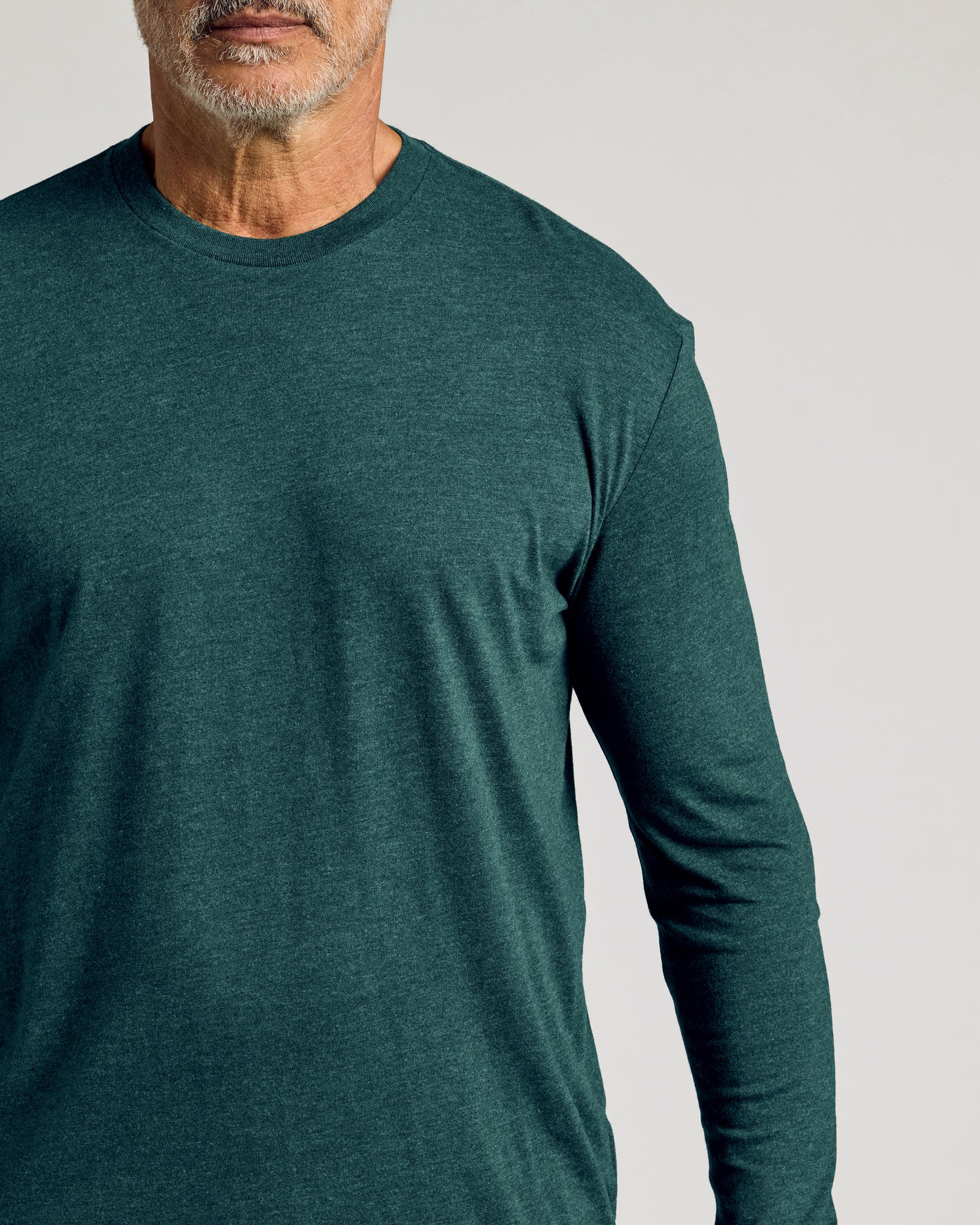 Dark Heather Seafarer Classic Long Sleeve Crew Neck worn by man.