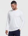 Man in All White Long Sleeve Crew Neck 3-Pack with navy pants.