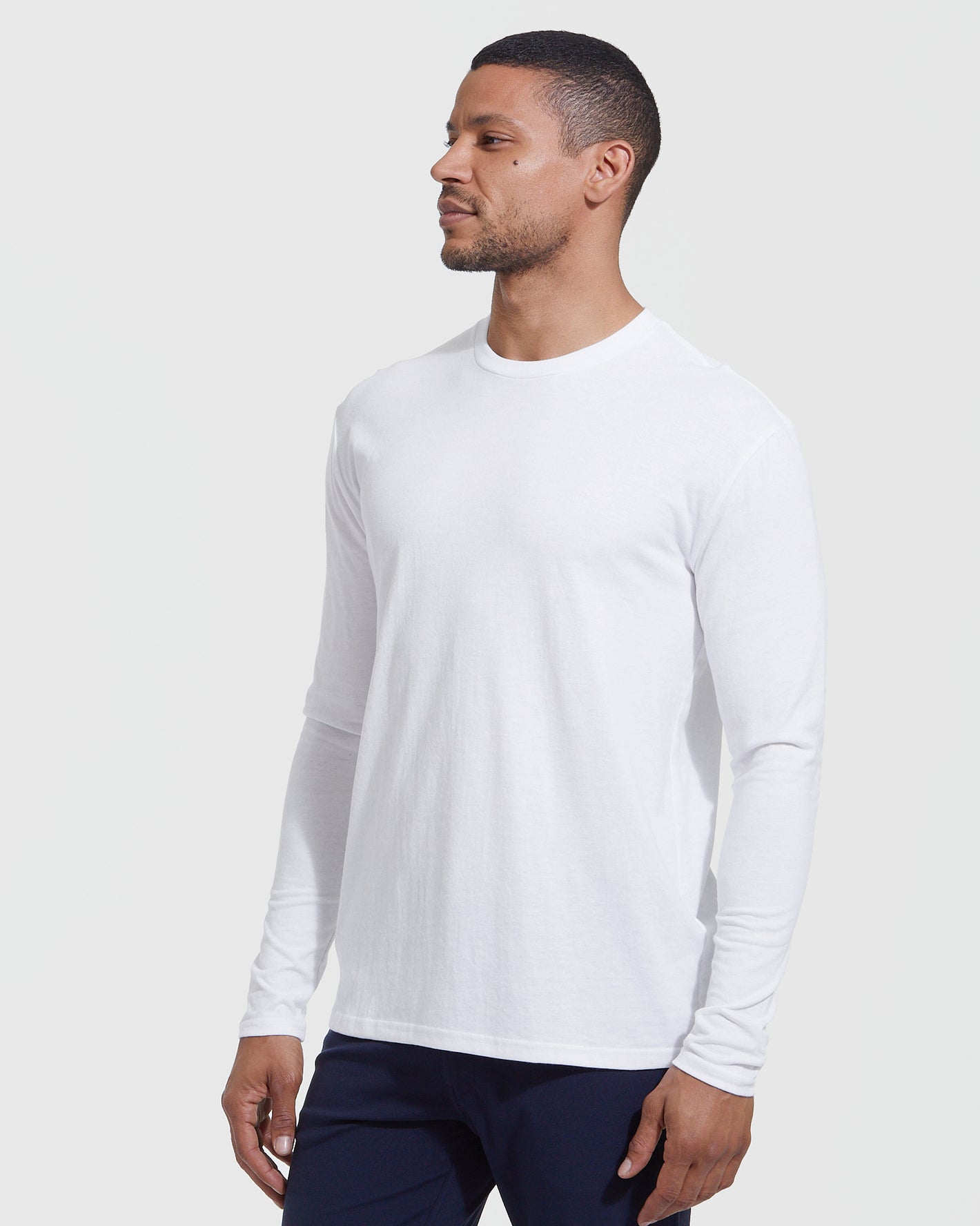 All White Long Sleeve Crew Neck 3-Pack on model.