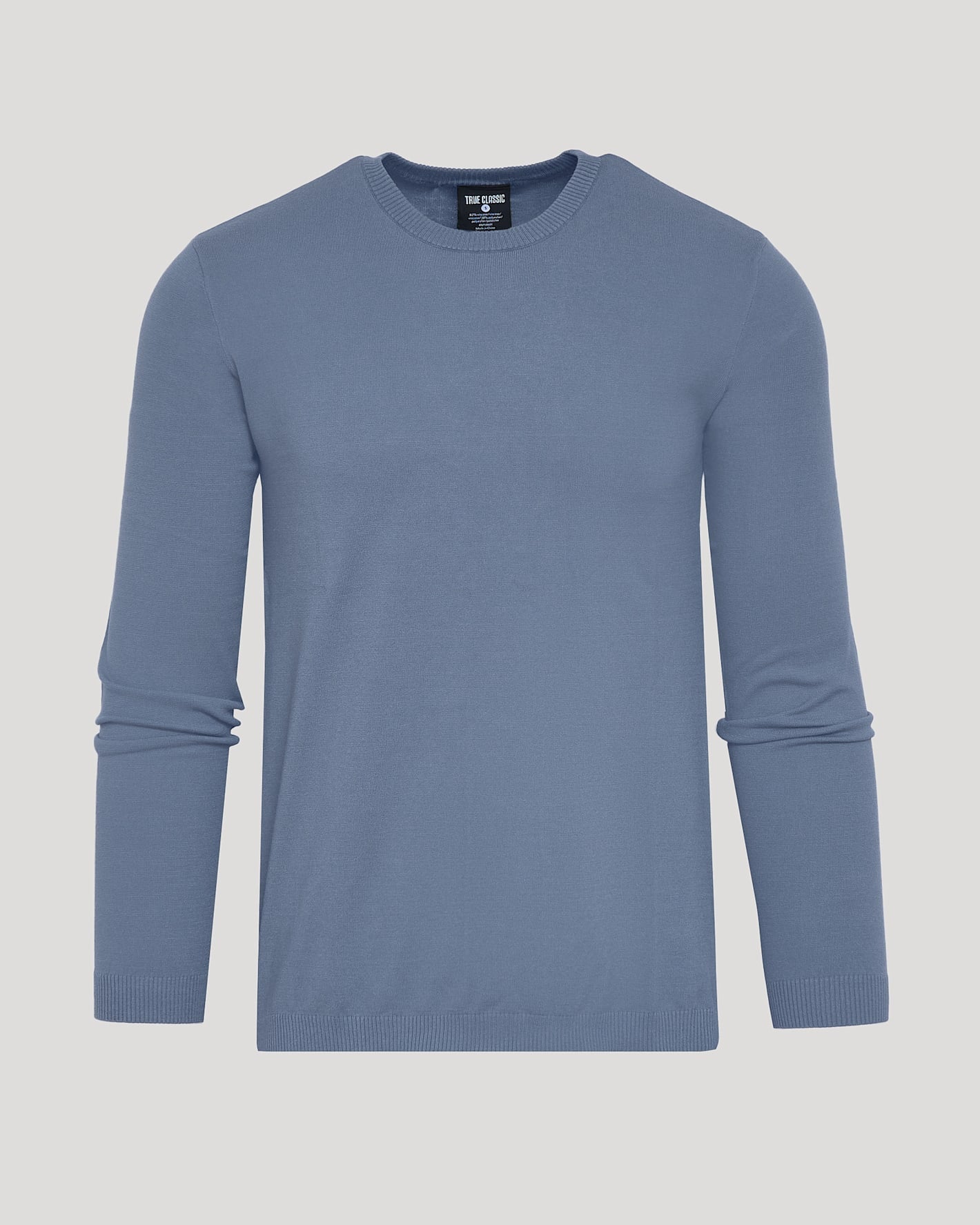 Fiord Dressy Crew Neck Sweater, light-blue, laid flat, slim fit.