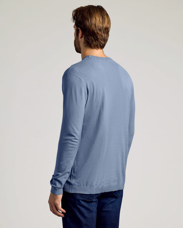 Fiord Dressy Crew Neck Sweater worn with dark jeans, back view.