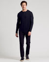 Man wearing All Black Classic Henley 3-Pack outfit.