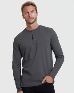 True ClassicMale model in dark-gray Classic Henley 3-Pack shirt, relaxed pose.