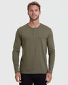 Man wearing an olive green long-sleeve henley shirt against a white background