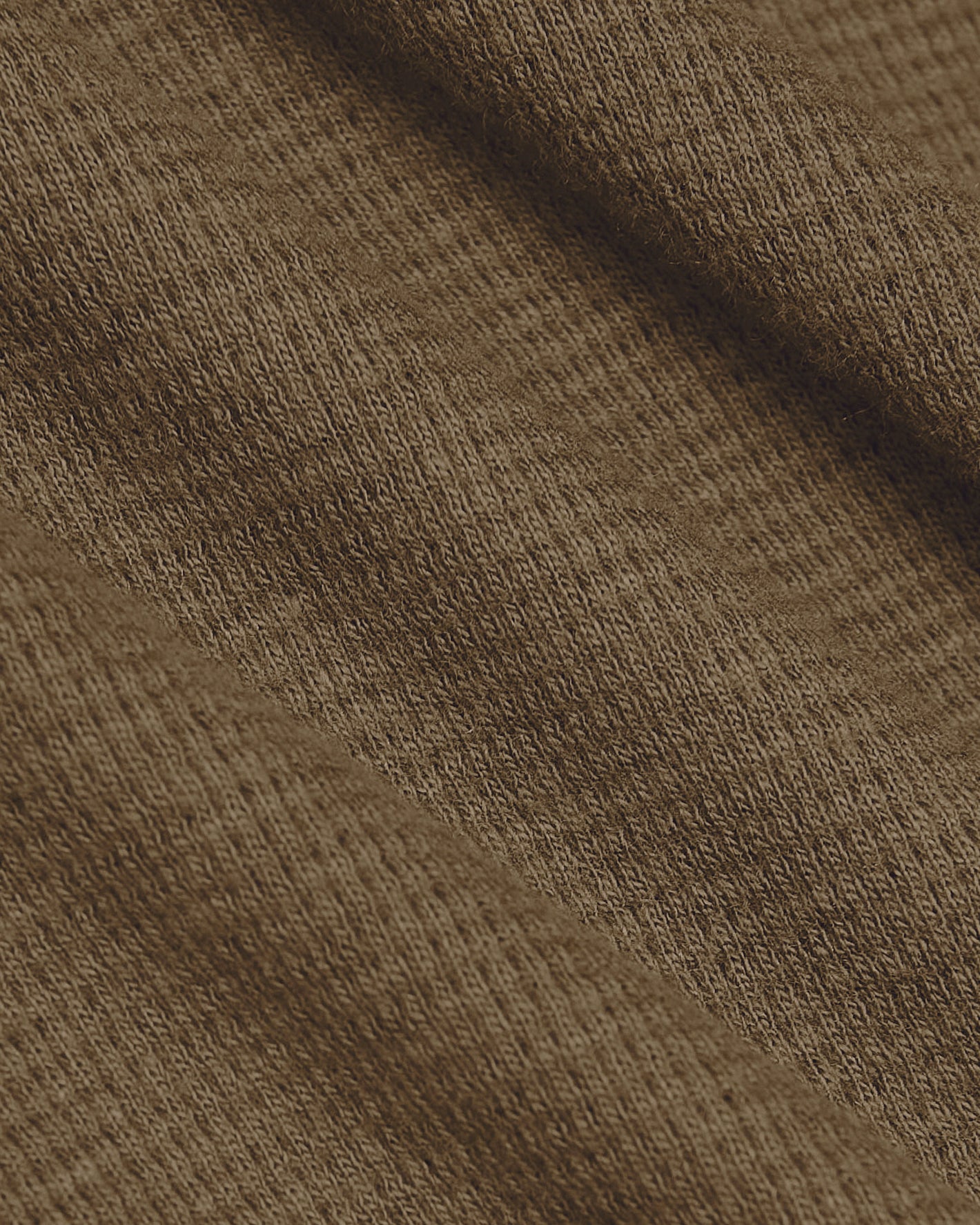 Alpaca Waffle Long Sleeve Crew Neck's soft, textured brown knit fabric.