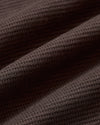 Dark Oak Waffle Long Sleeve Crew Neck in soft, textured fabric folds.