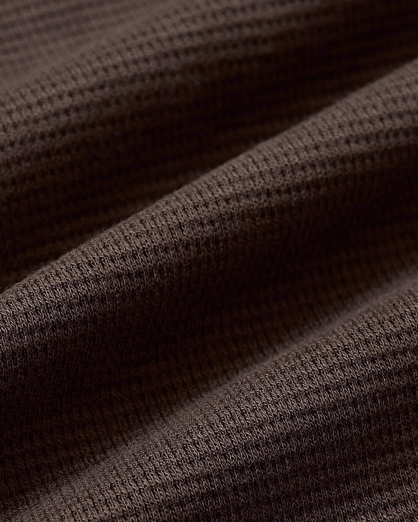 Dark Oak Waffle Long Sleeve Crew Neck in soft, textured fabric folds.