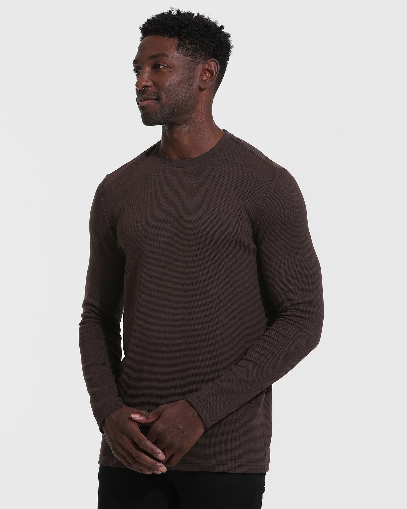 Dark Oak Waffle Long Sleeve Crew Neck modeled by a man.
