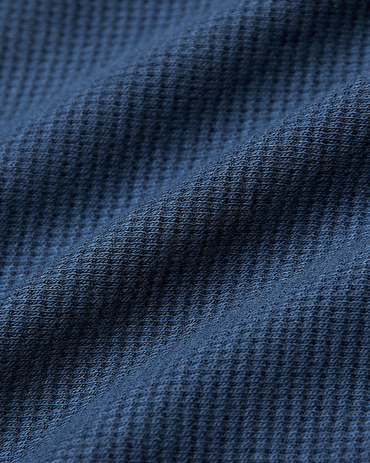 Deep Sea Blue Long Sleeve Waffle Crew fabric close-up, showcasing texture.
