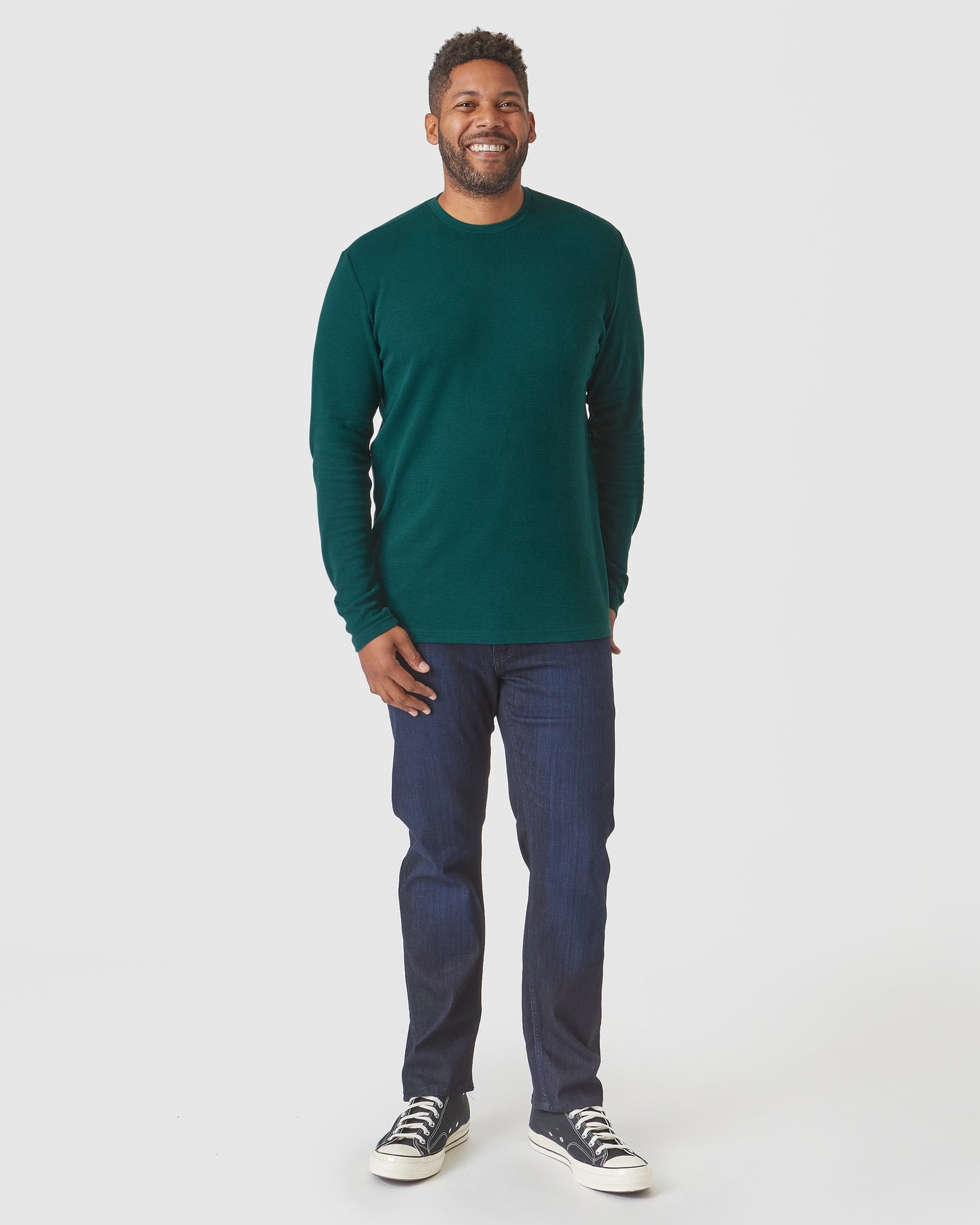 Evergreen Heather Waffle Long Sleeve Crew Neck on smiling man, casual style.