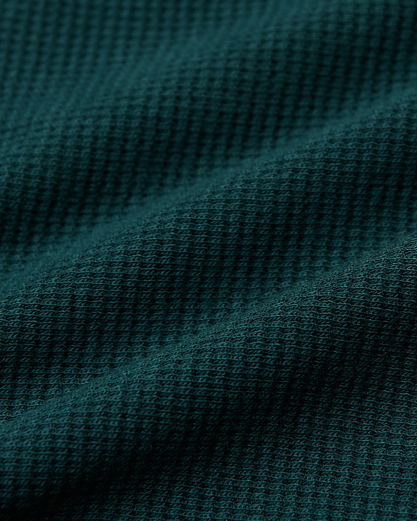 Evergreen Heather Waffle Long Sleeve Crew Neck, showcasing waffle-knit texture.