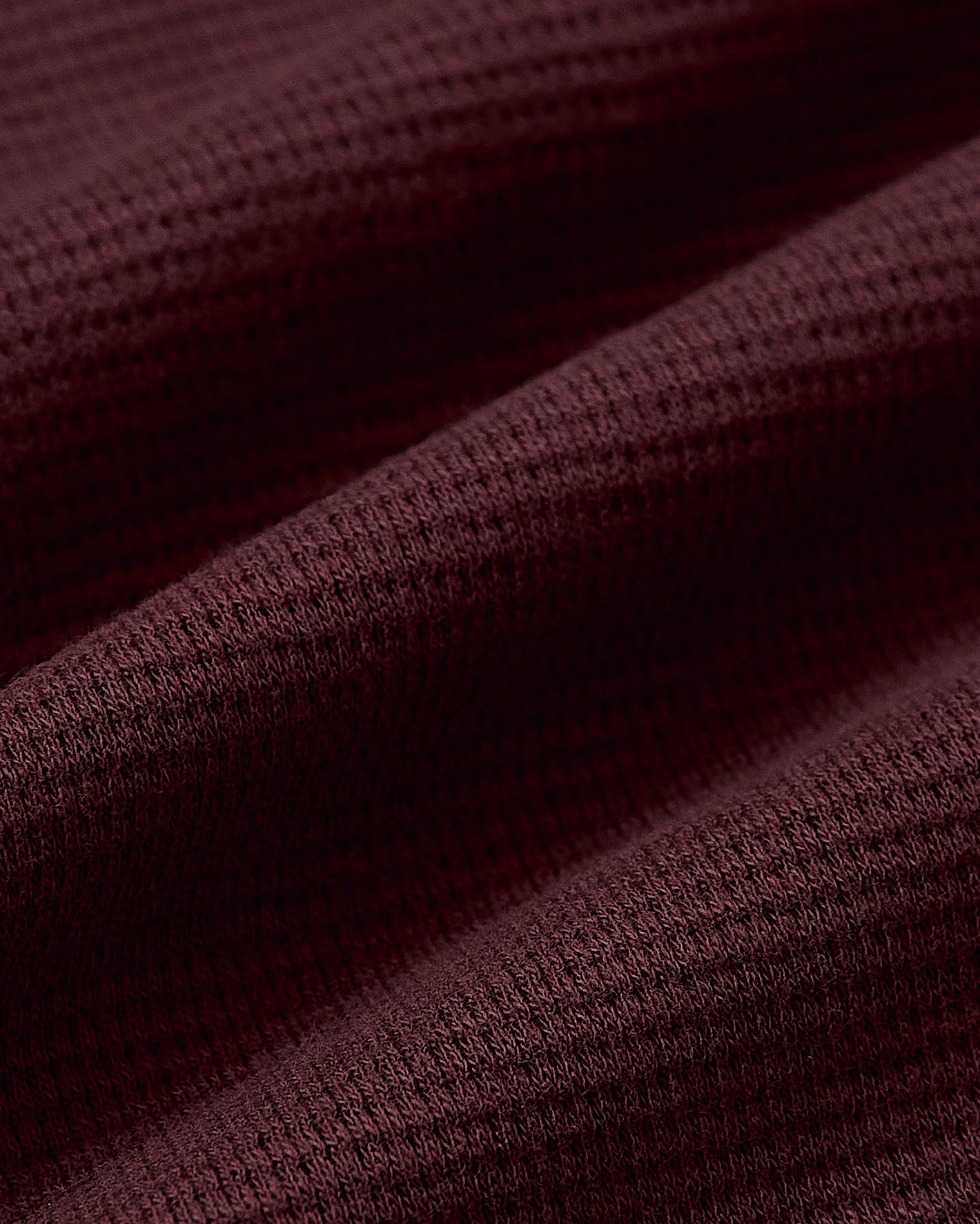 Mahogany Long Sleeve Waffle Crew fabric close-up, showcasing textured grid pattern.