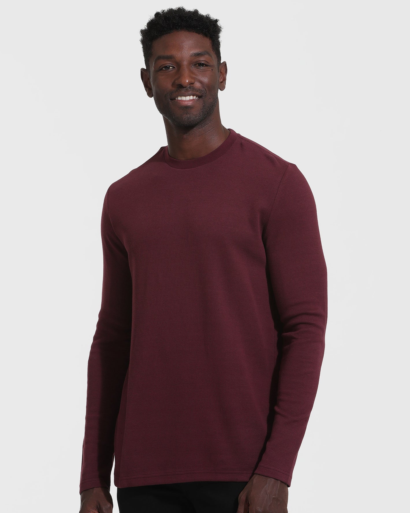 Mahogany Long Sleeve Waffle Crew worn by model, relaxed pose.
