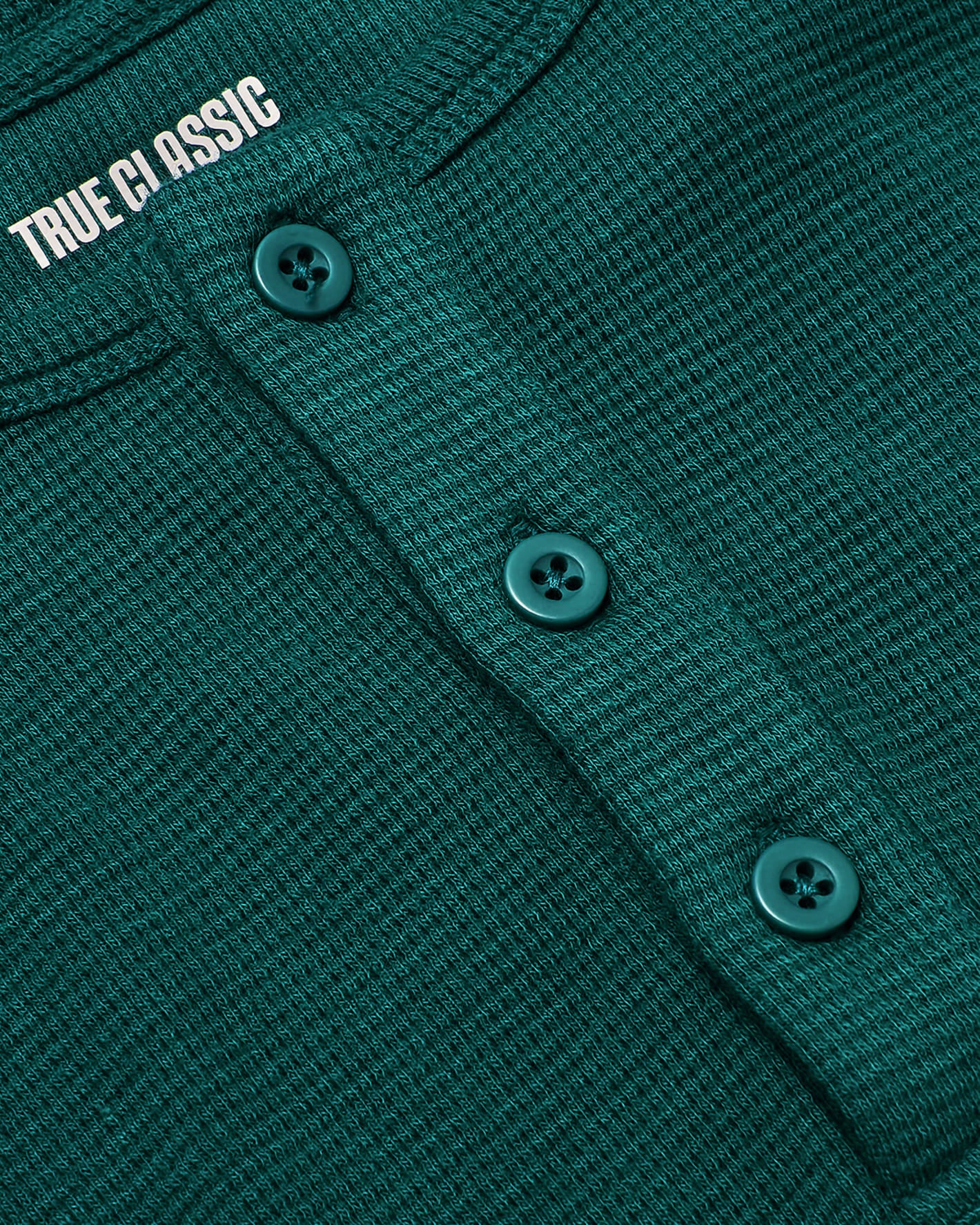 Deep Emerald Waffle Long Sleeve Henley, textured knit, three-button placket.