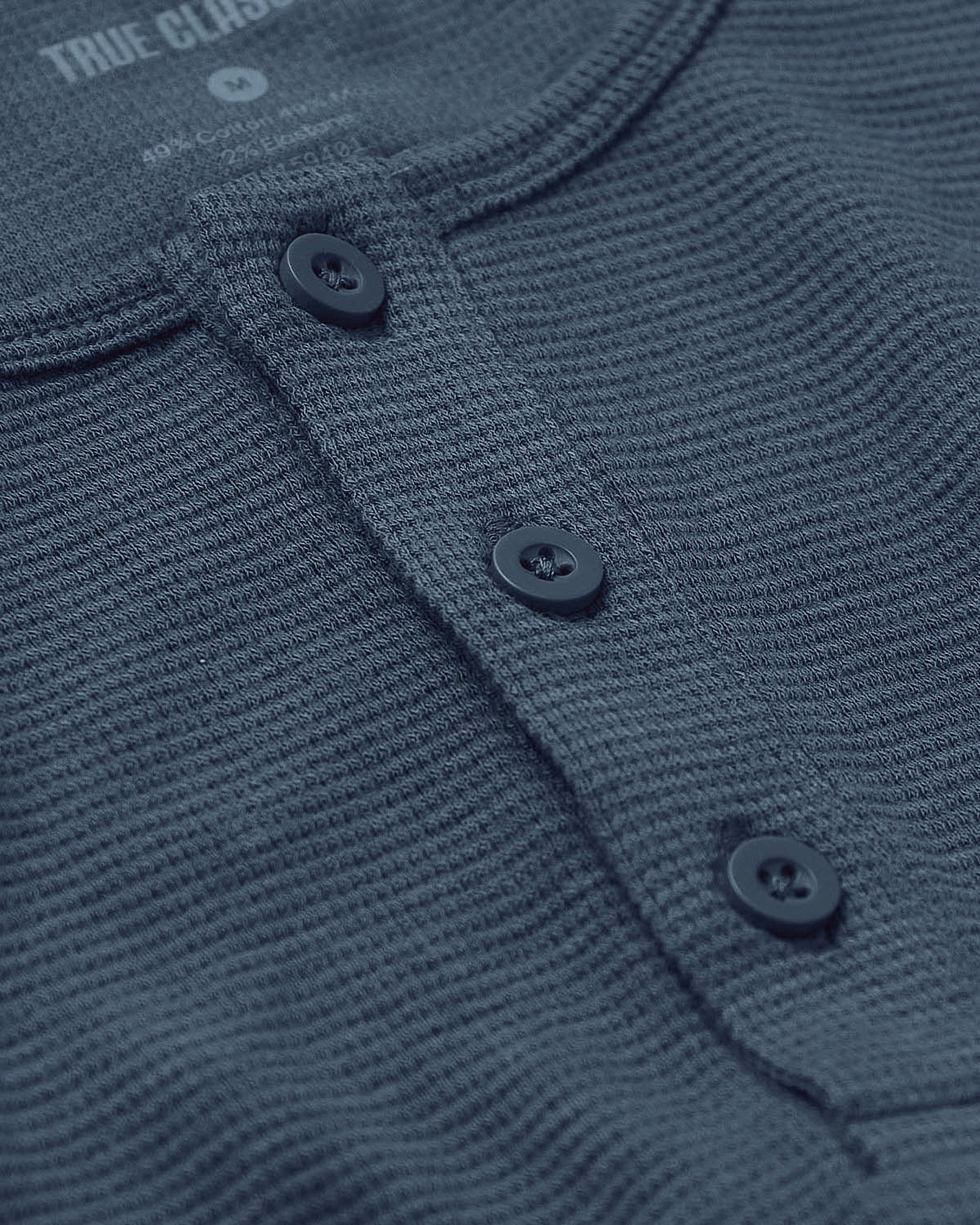 Fiord Waffle Long Sleeve Henley with waffle-knit texture and 3-button placket.