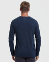 Man wearing Navy Waffle Long Sleeve Henley, back view against light background.