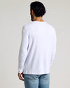 Man in White Waffle Long Sleeve Henley 3-Pack, back view.