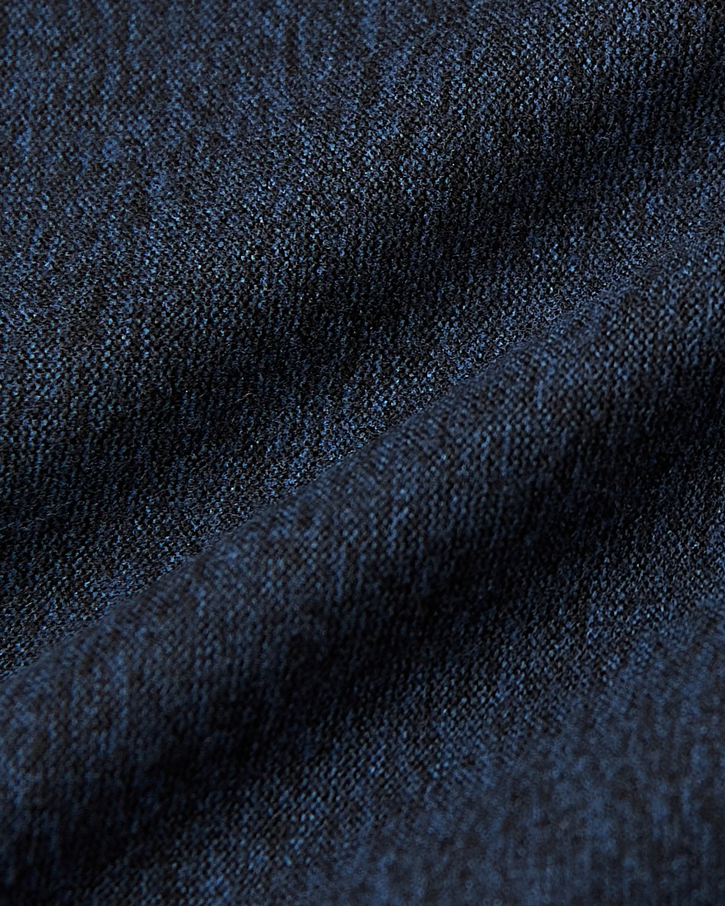 Macro view of Deep Sea Blue Heather Active Long Sleeve Crew T Shirt fabric.