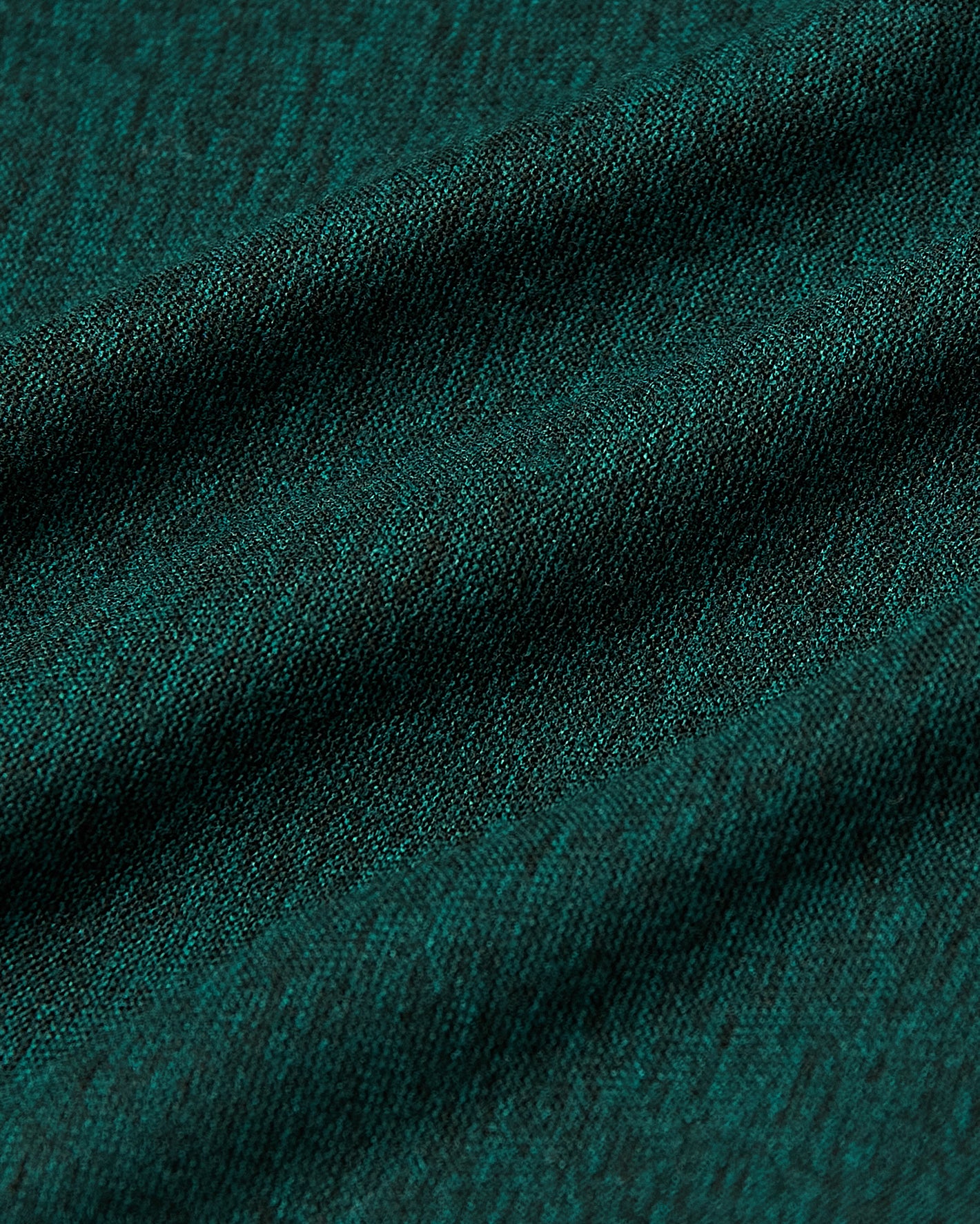 Evergreen Heather Active Long Sleeve Crew T-Shirt's fine knit texture.