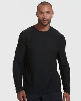 Man wearing Black Active Long Sleeve Crew Neck T-Shirt with earrings.