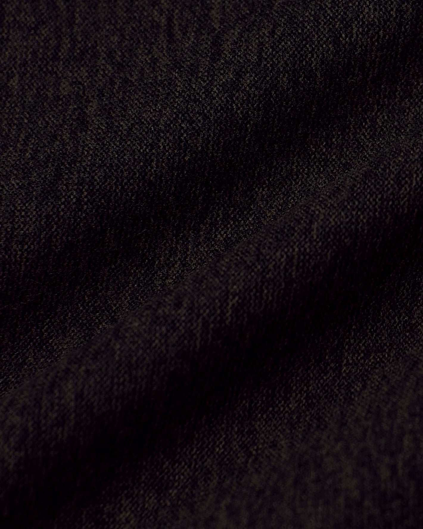 Dark Heather Cocoa Active Long Sleeve Crew T-Shirt's textured black fabric close-up.