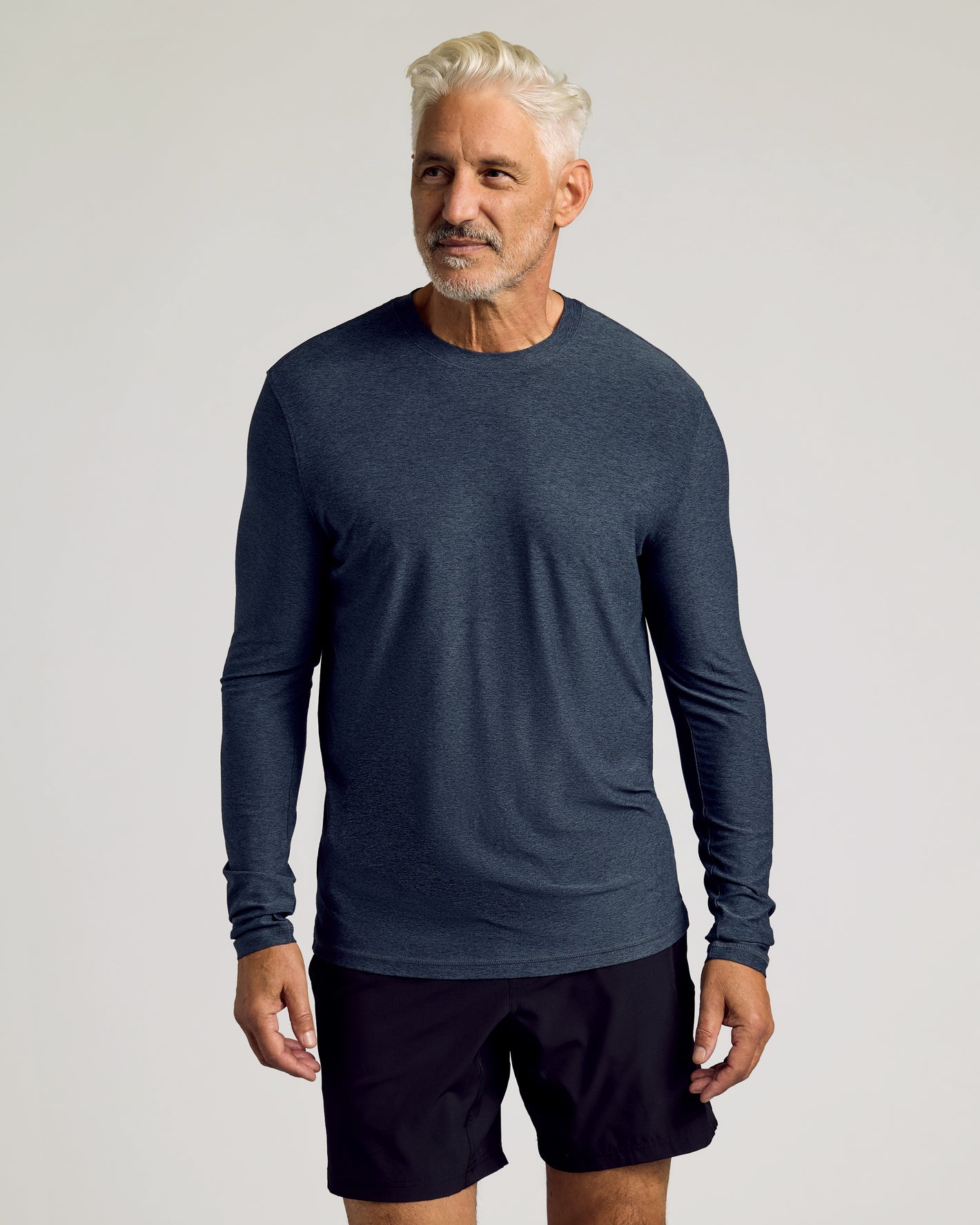 Man wearing Dark Heather Fiord Active Long Sleeve Crew T-Shirt.