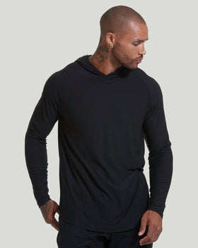Man wearing Black Active Hoodie with neck tattoos.