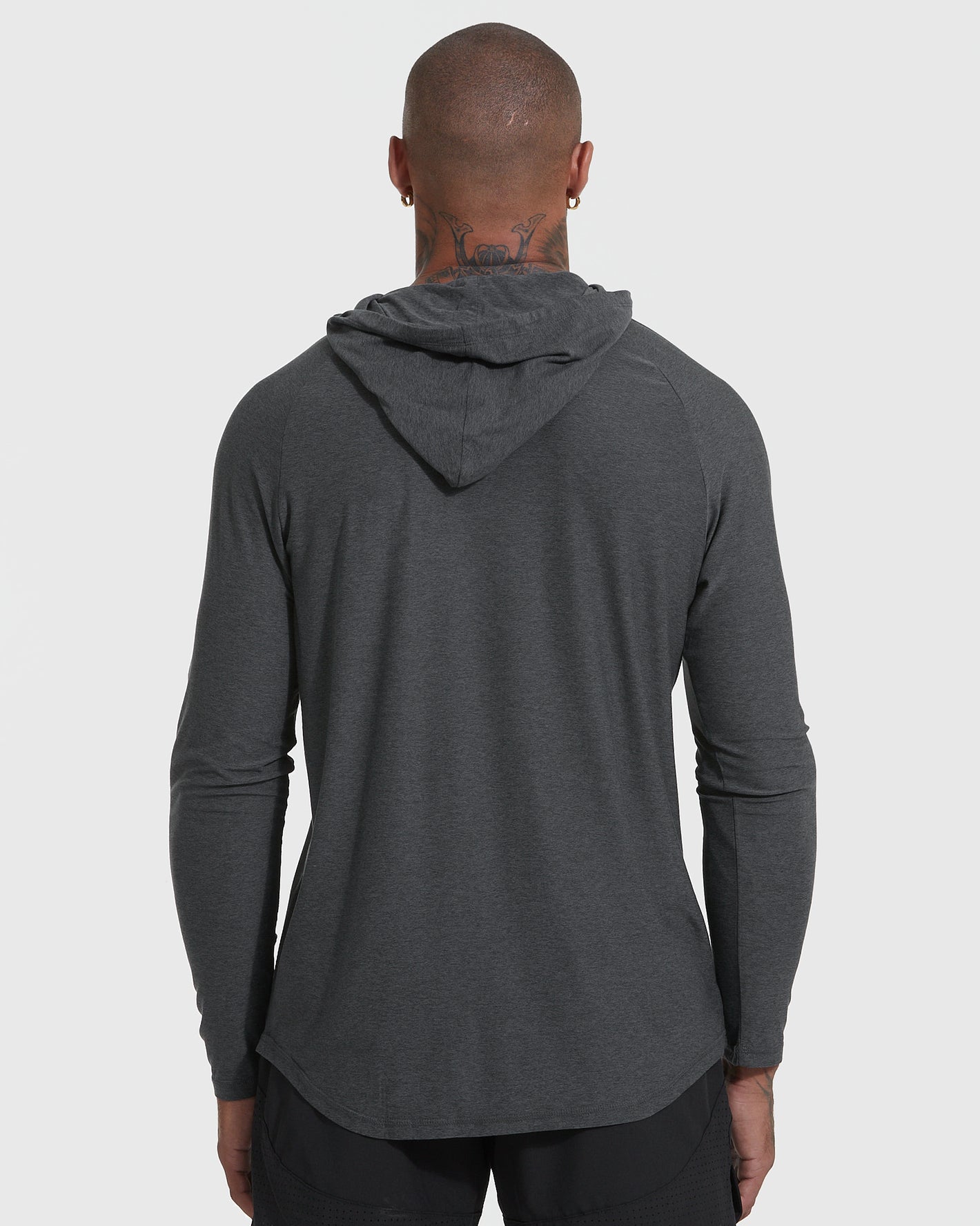 Man wearing Charcoal Heather Gray Active Hoodie, back view, hood flat.