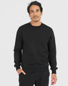 Model wearing Black Pullover Fleece Crew & Jogger 2-Pack.